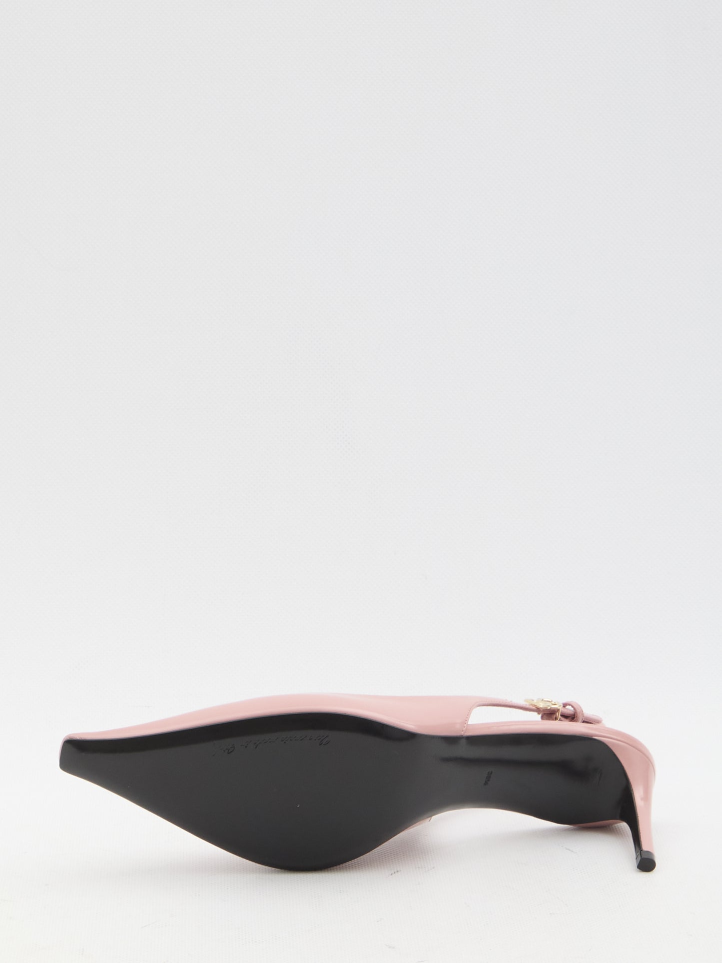 Pointed-toe slingback pumps