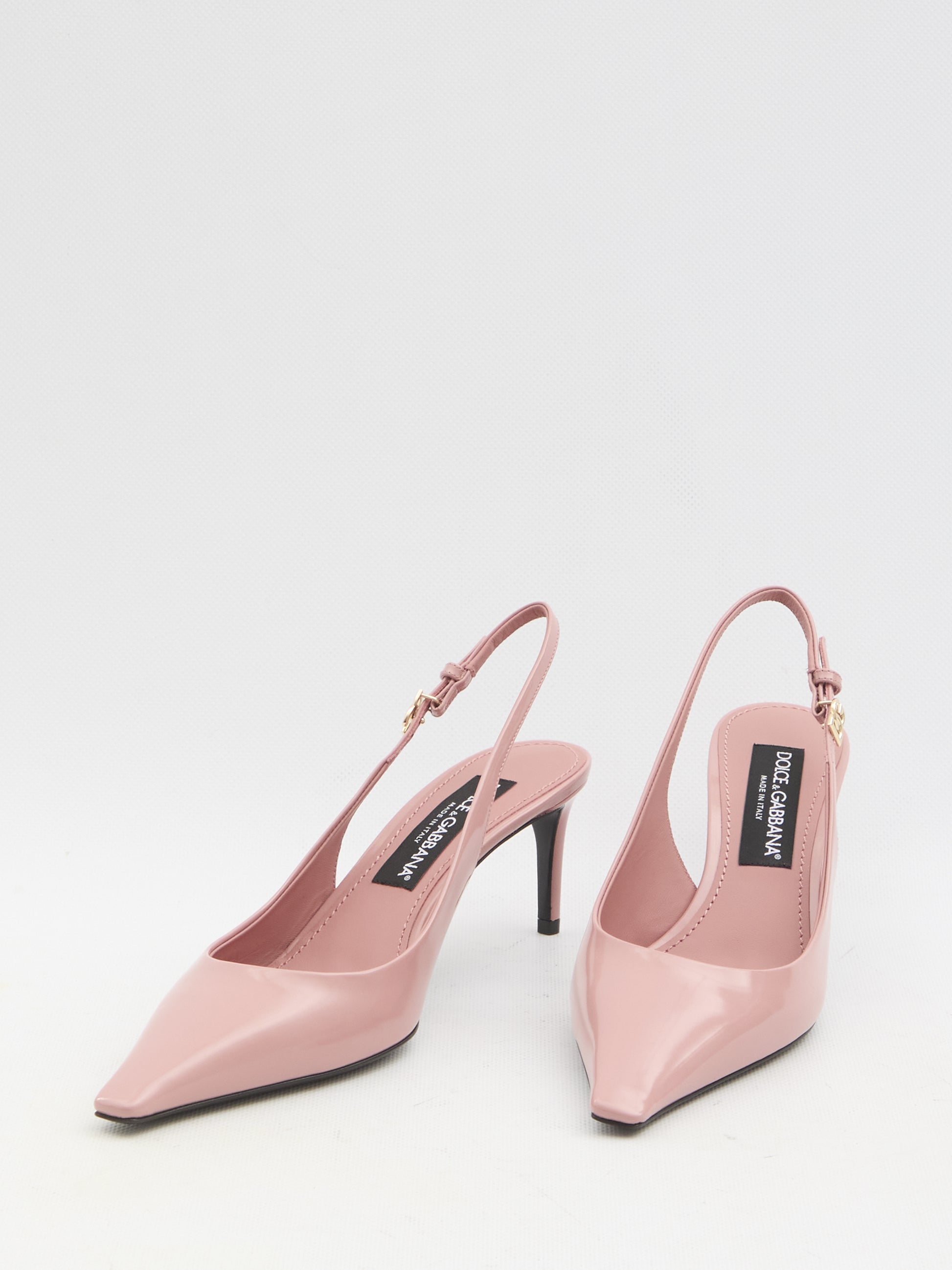 Pointed-toe slingback pumps