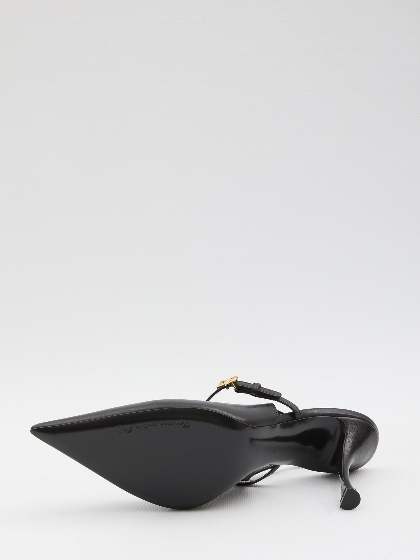 Black leather slingback pumps