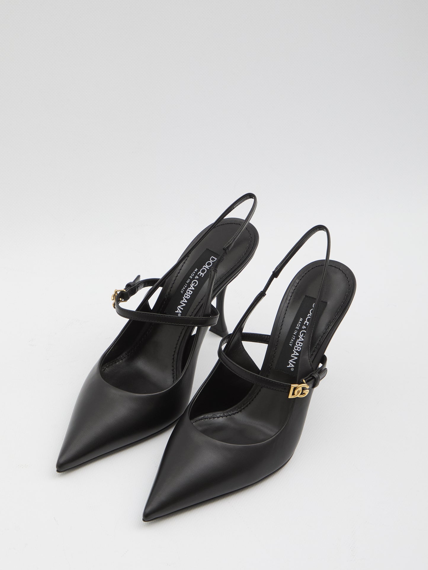 Black leather slingback pumps
