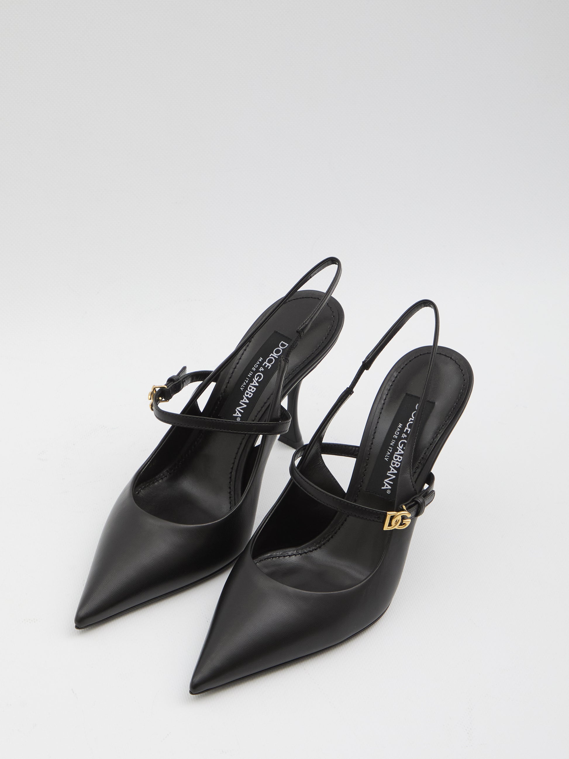 Black leather slingback pumps