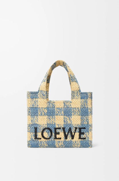 Bolso de mano con fuente pequeña